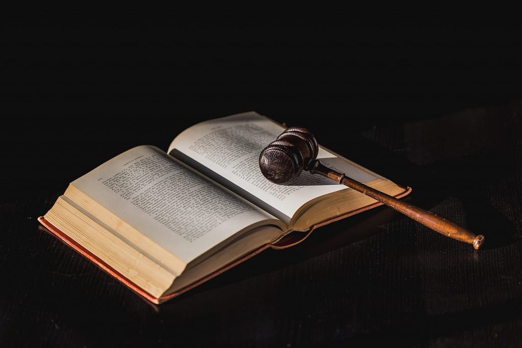 gavel on law book scaled The Long And Short Of Entertainment Law Lawyer Connection