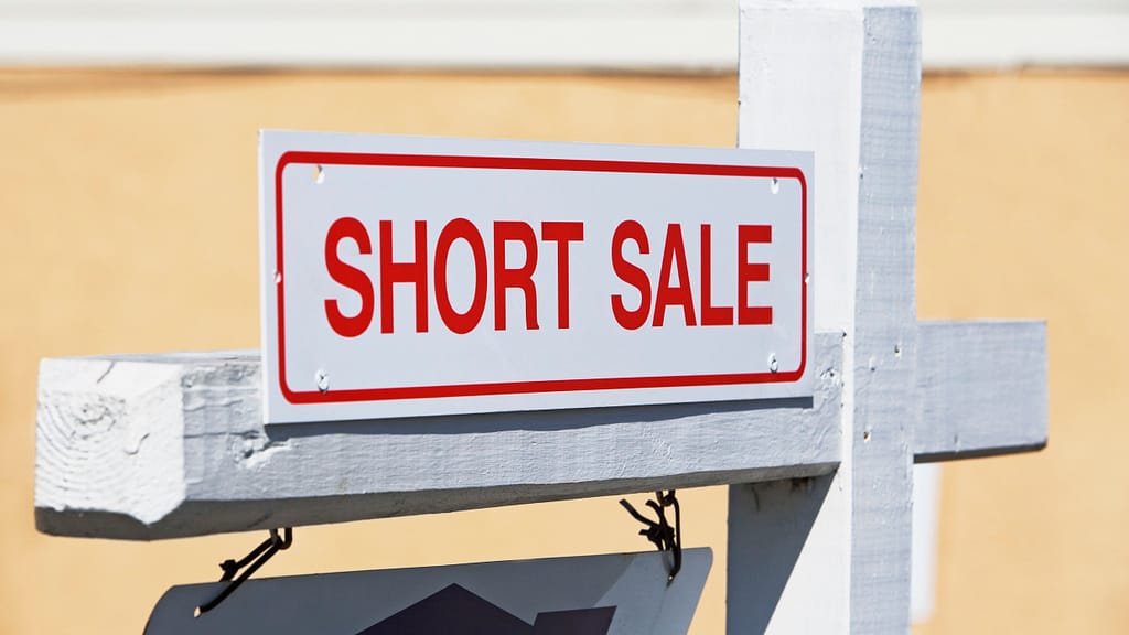 short sale sign 88296593 5c1e3f01c9e77c0001b529d6 scaled What Does Under Contract Mean When Buying or Selling A Home? Lawyer Connection