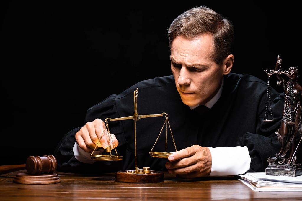 VistaCreate 313992986 stock photo judge judicial robe sitting table scaled How Much Is The Average Slip and Fall Settlement? Lawyer Connection